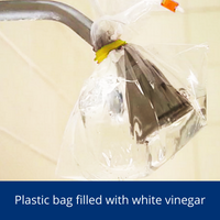 Plastic filled with vinegar-showered head cleaning